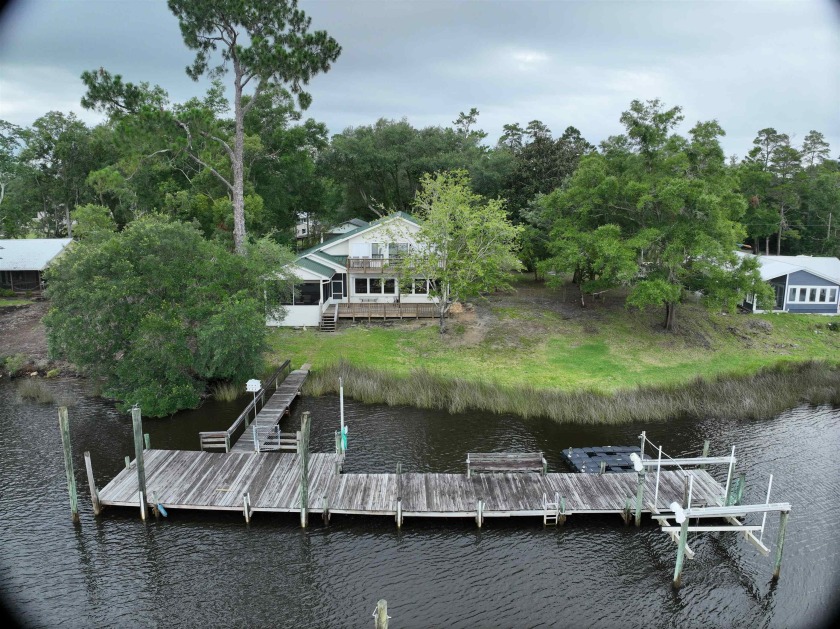 Riverfront home and 7 lots.   Situated near downtown Carrabelle - Beach Home for sale in Carabelle, Florida on Beachhouse.com