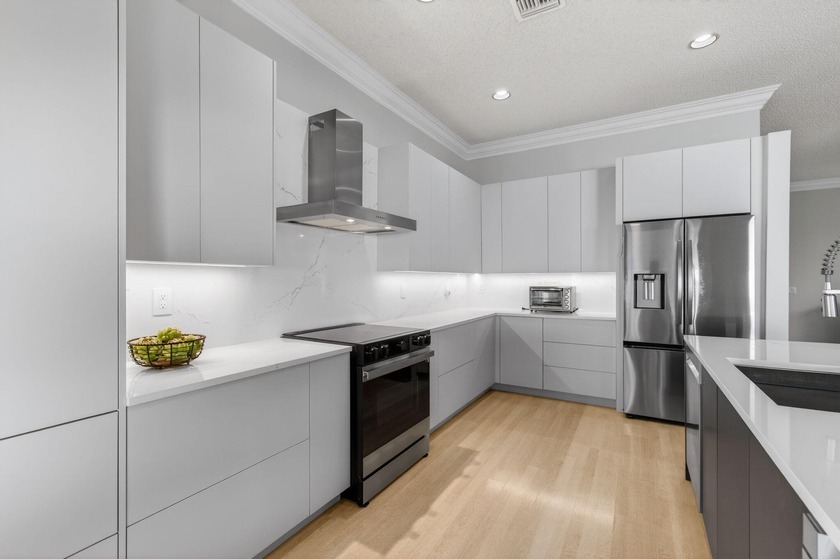 IMMACULATE RENOVATED 3BR Mediterranean model in lush 55+ - Beach Home for sale in Boynton Beach, Florida on Beachhouse.com