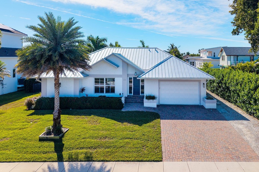 This remodeled 3 bedroom 2 bathroom extra wide lot waterfront - Beach Home for sale in Marco Island, Florida on Beachhouse.com