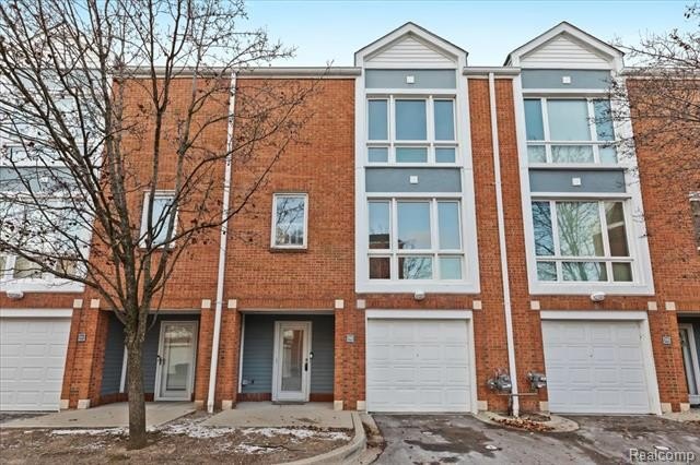 Welcome home to easy, low-maintenance living in this beautifully - Beach Condo for sale in Detroit, Michigan on Beachhouse.com