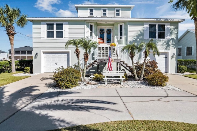 Nestled along the tranquil shores of a picturesque water canal - Beach Home for sale in Hernando Beach, Florida on Beachhouse.com