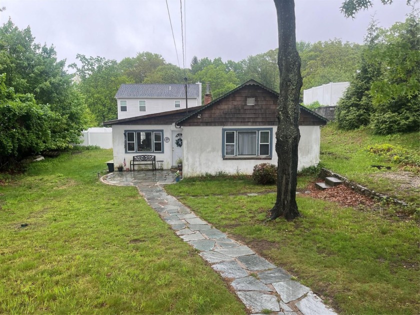 Welcome to 45 Zenith Road! This charming ranch home offers 2 - Beach Home for sale in Rocky Point, New York on Beachhouse.com