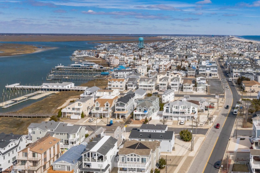 This 3-story gem hidden in a residential community offers 5 beds - Beach Home for sale in Sea Isle City, New Jersey on Beachhouse.com