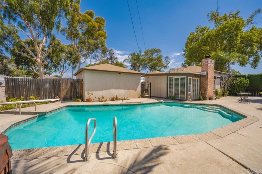 With an outdoor entertainer's dream pool and oriented on a - Beach Home for sale in Lakewood, California on Beachhouse.com