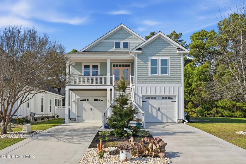 A sparkling sunrise over the pond, coastal breezes through the - Beach Home for sale in Holly Ridge, North Carolina on Beachhouse.com