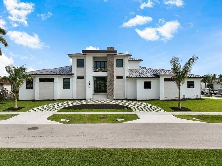 From the moment you arrive, this remarkable two-story waterfront - Beach Home for sale in Marco Island, Florida on Beachhouse.com