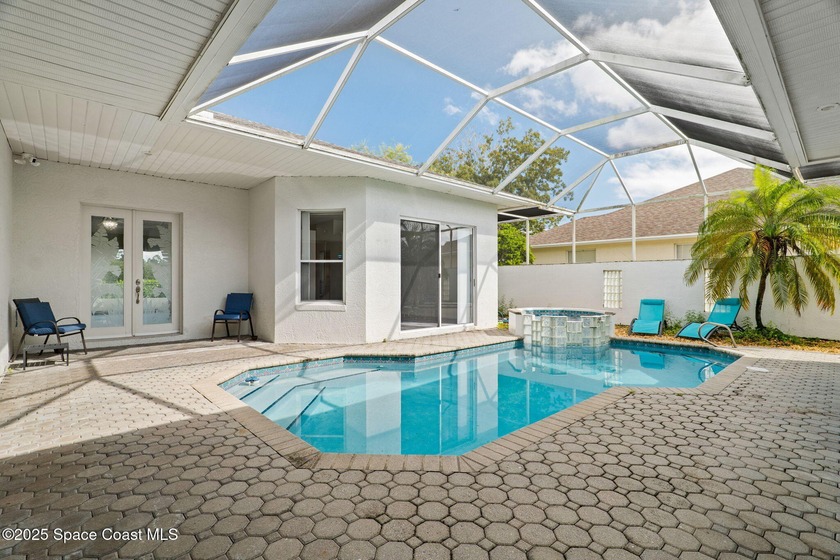 This home is located on a beautiful 18-hole course with a - Beach Home for sale in Merritt Island, Florida on Beachhouse.com