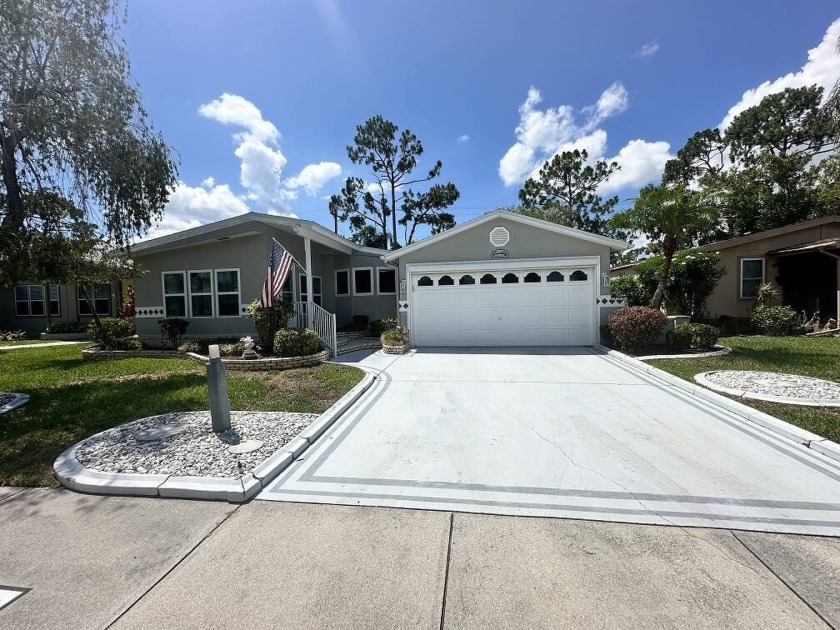 Lot rent for this property is $1,037.00/monthly.   Move in - Beach Home for sale in North Fort Myers, Florida on Beachhouse.com