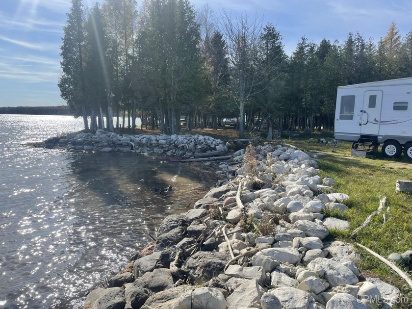 Waterfront Lot with Travel Trailer on Indian Lake - Perfect for - Beach Lot for sale in Manistique, Michigan on Beachhouse.com