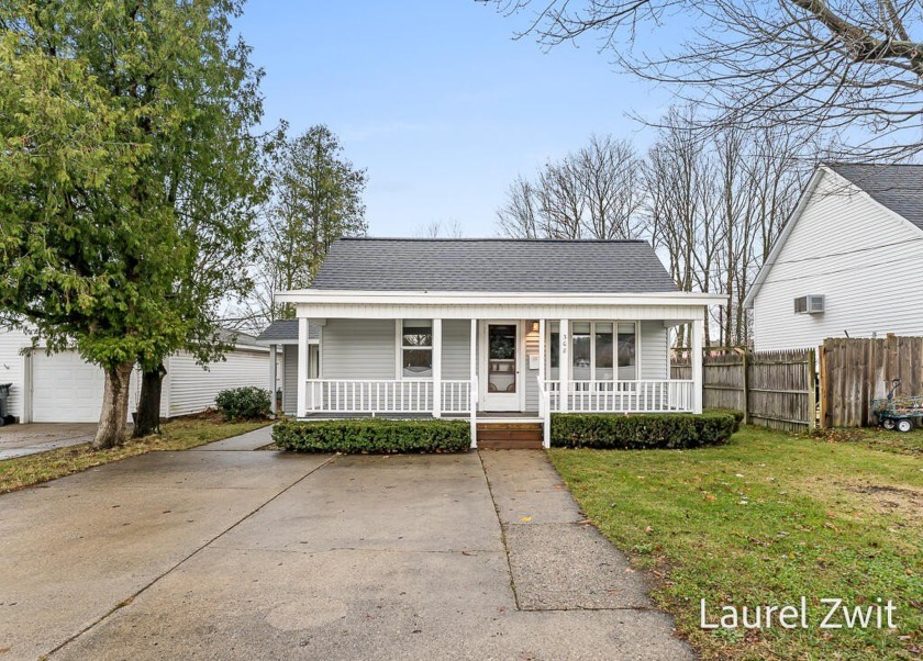 This charming home in Whitehall is a must see, and with - Beach Home for sale in Whitehall, Michigan on Beachhouse.com