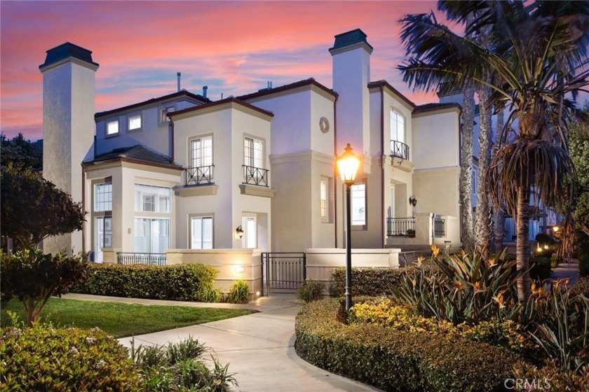 Envision a life of unparalleled luxury in a residence just steps - Beach Townhome/Townhouse for sale in Huntington Beach, California on Beachhouse.com