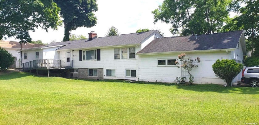 This lovely 2-bedroom, 1-bath, ranch-style home can be awakened - Beach Home for sale in Northport, New York on Beachhouse.com