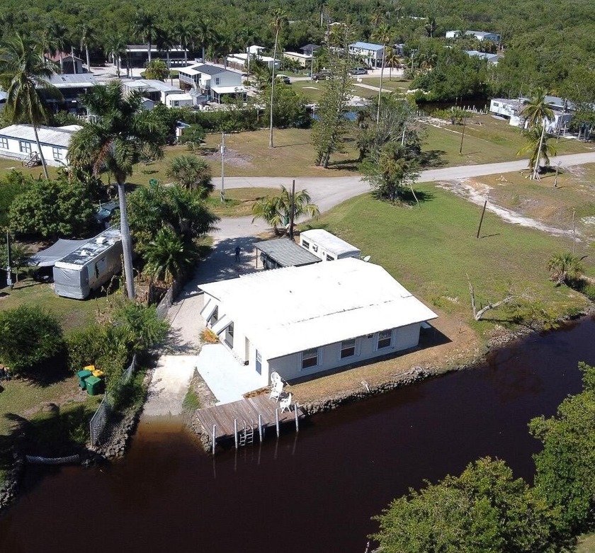 Waterfront Double Wide Mobile Home with large addition on - Beach Home for sale in Everglades City, Florida on Beachhouse.com