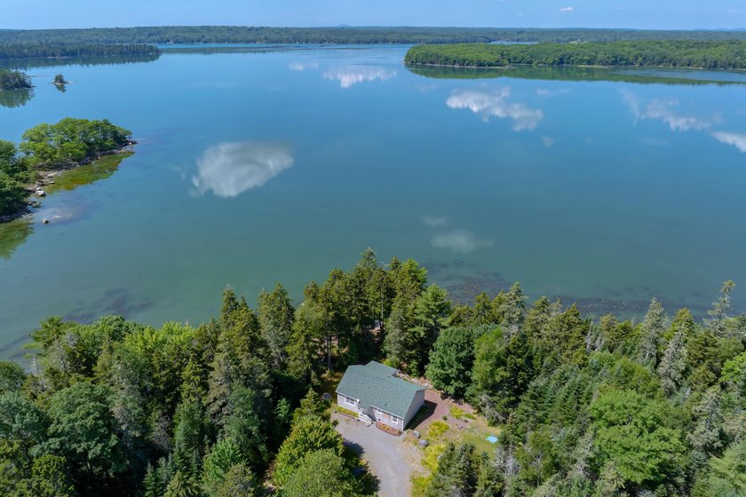 Enjoy the afternoon sea breeze on a private deck set along 492 - Beach Home for sale in Franklin, Maine on Beachhouse.com