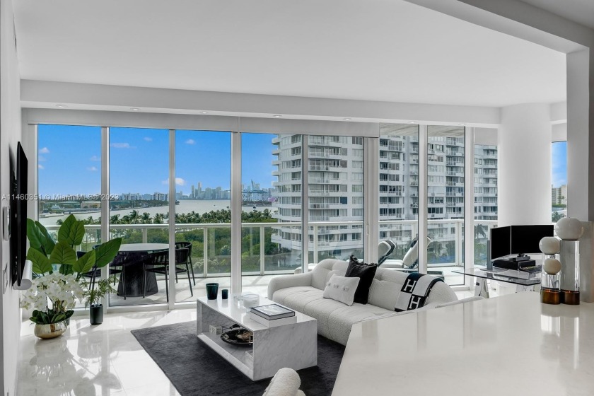 Enjoy unobstructed sunsets in this rare corner luxury residence - Beach Condo for sale in Miami Beach, Florida on Beachhouse.com