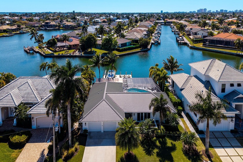 Experience elevated waterfront living on Marco Island with - Beach Home for sale in Marco Island, Florida on Beachhouse.com
