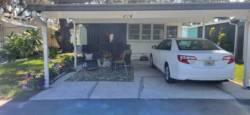 This beautifully maintained 34' x 14' home is the ideal escape - Beach Home for sale in New Port Richey, Florida on Beachhouse.com