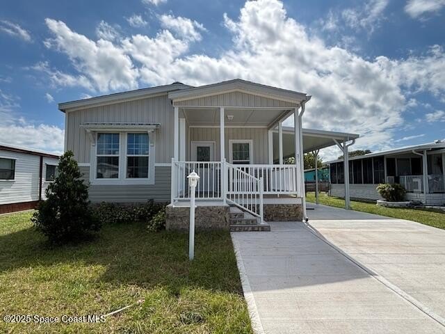 Experience modern Florida living in this stunning new - Beach Home for sale in Barefoot Bay, Florida on Beachhouse.com