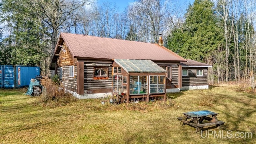 Charming Log Cabin on Nearly 10 Acres Near Munising! Discover - Beach Home for sale in Munising, Michigan on Beachhouse.com