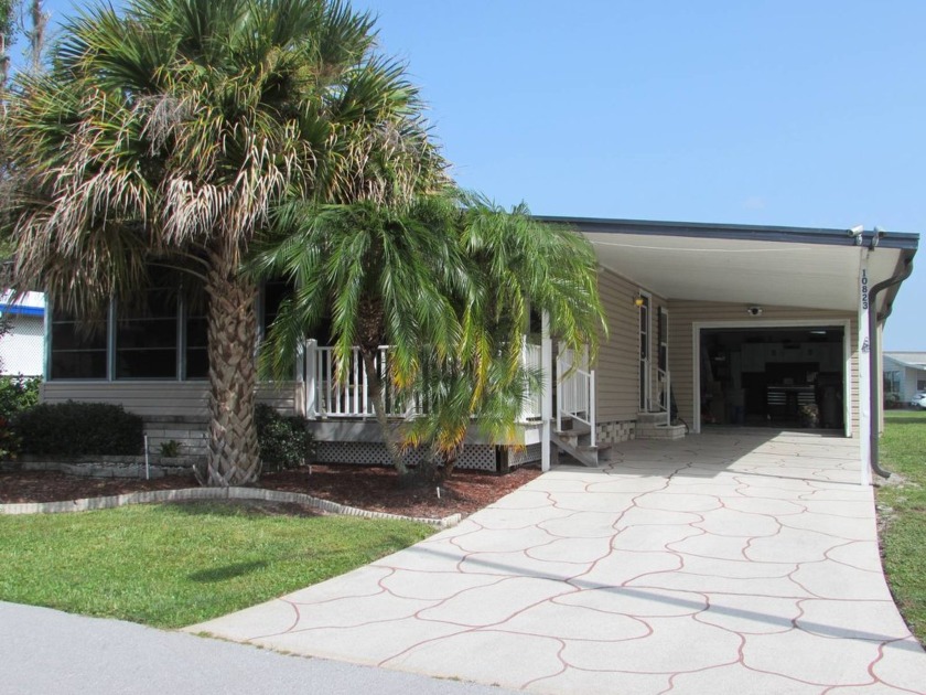 This beautifully remodeled 2 bed 2 bath with full garage is well - Beach Home for sale in Trinity, Florida on Beachhouse.com