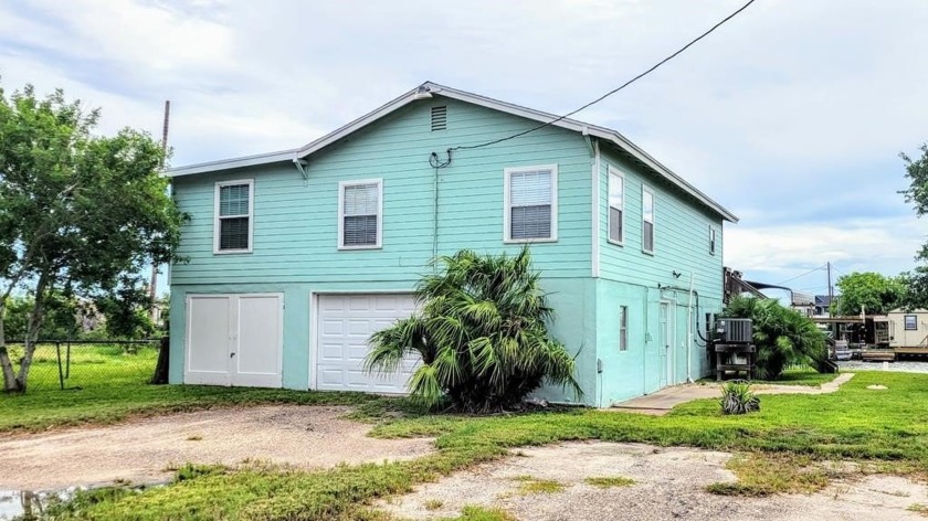 Your Coastal Getaway Awaits! Tucked just off Copano Bay with - Beach Home for sale in Rockport, Texas on Beachhouse.com