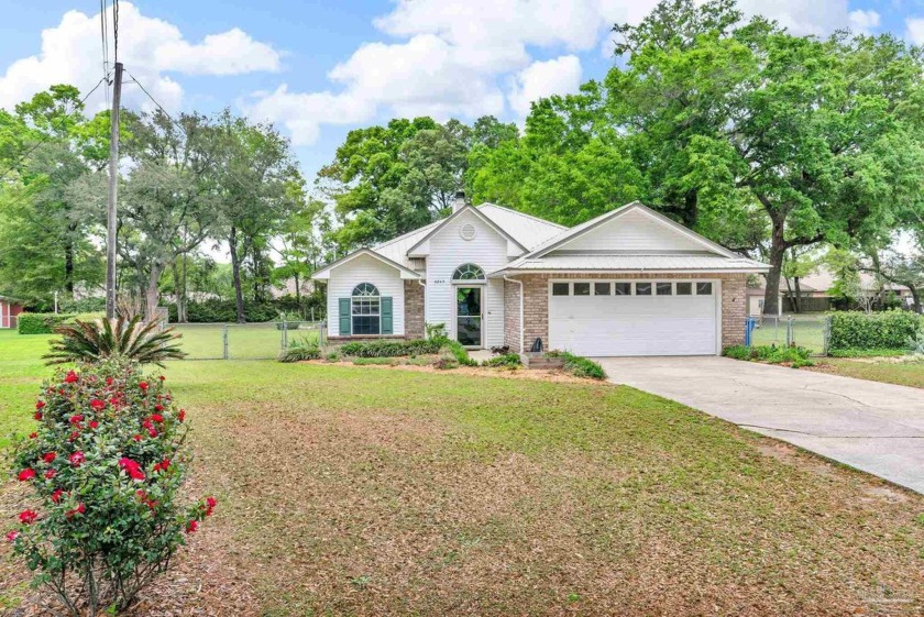 Welcome to this beautiful home situated on 0.62 acre lot in a - Beach Home for sale in Pace, Florida on Beachhouse.com