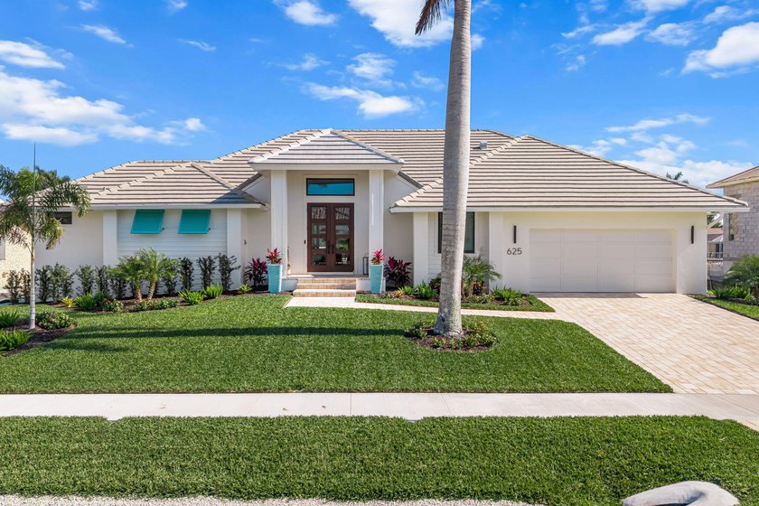 Welcome to an extraordinary waterfront estate in the coveted - Beach Home for sale in Marco Island, Florida on Beachhouse.com