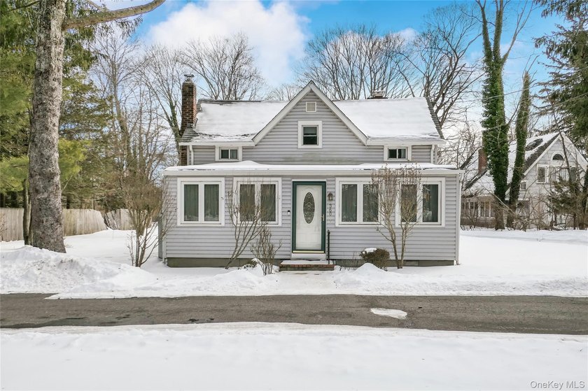 This charming, expanded Cape Cod style residence sits gracefully - Beach Home for sale in Brookhaven, New York on Beachhouse.com