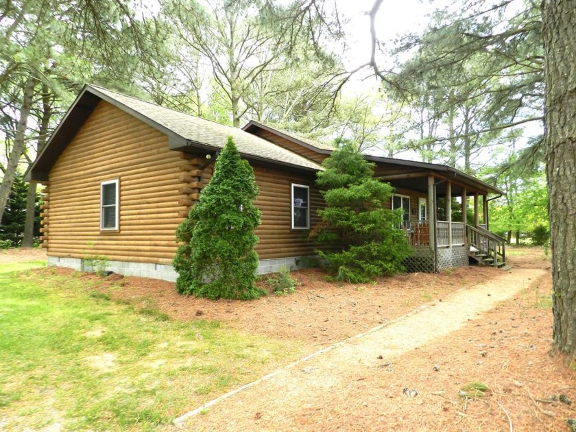 Log Cabin nestled amongst the trees with path to private dock on - Beach Home for sale in Machipongo, Virginia on Beachhouse.com