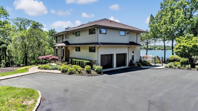 WATERFRONT WITH DEEP WATER DOCK AND 224 FT. ON PORT JEFFERSON - Beach Home for sale in Port Jefferson, New York on Beachhouse.com