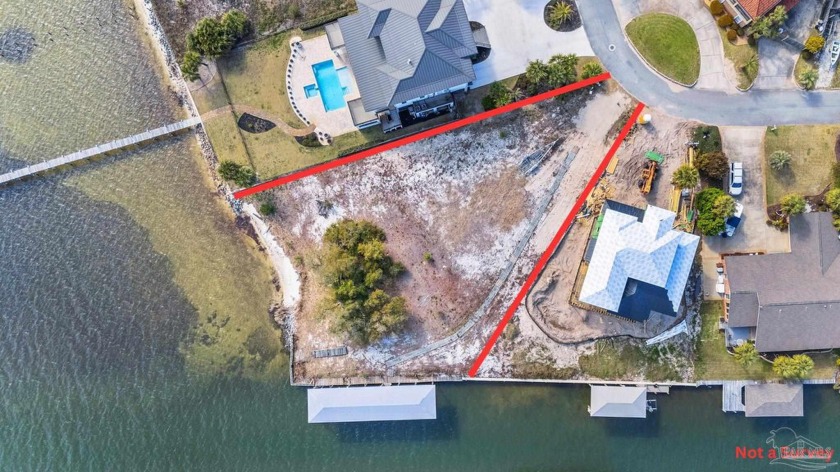 Discover a rare and exceptional .57-acre corner waterfront - Beach Lot for sale in Gulf Breeze, Florida on Beachhouse.com