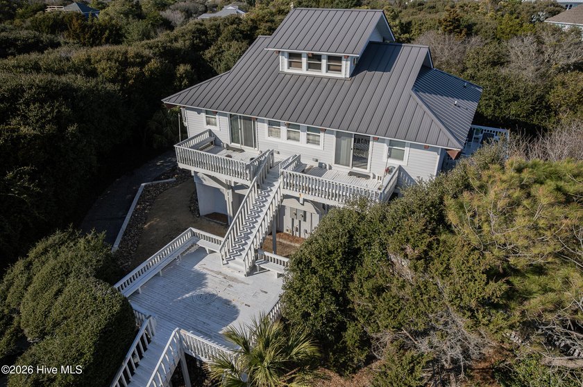 Experience exceptional coastal living in this stunning 8-bedroom - Beach Home for sale in Emerald Isle, North Carolina on Beachhouse.com