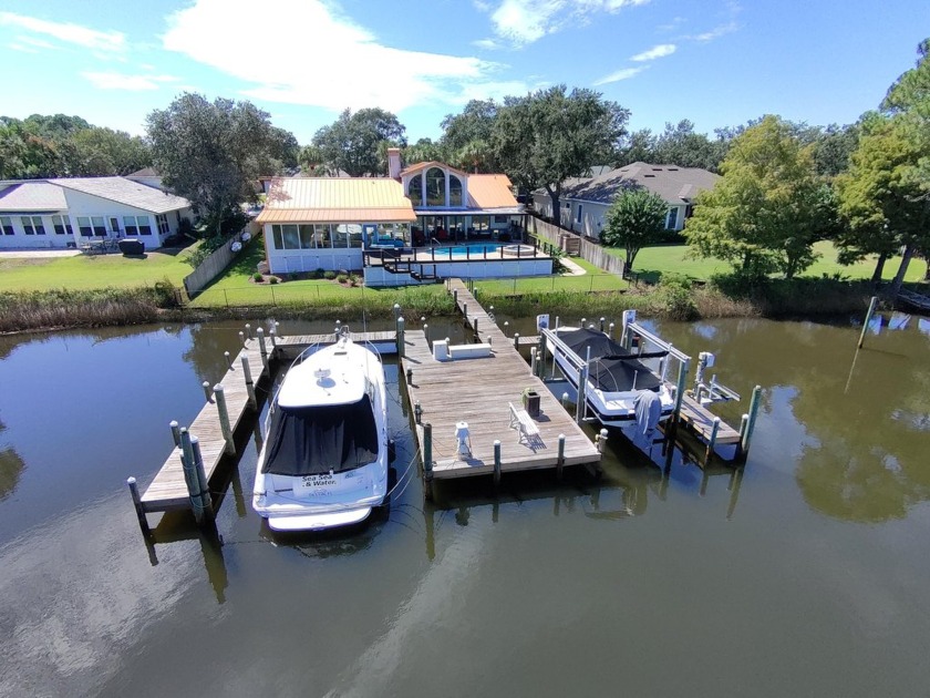 This exceptional home offers deep-water moorage and 100 feet of - Beach Home for sale in Destin, Florida on Beachhouse.com