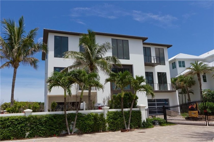 Embrace paradise in this 3-story home boasting panoramic views - Beach Home for sale in Jensen Beach, Florida on Beachhouse.com