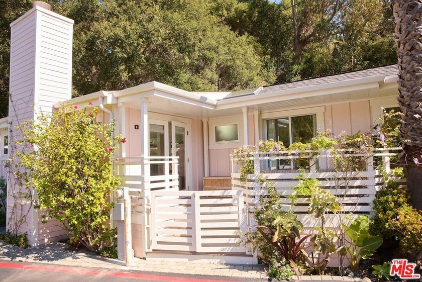 Sun-drenched, turn-key, and effortlessly inviting, this - Beach Home for sale in Malibu, California on Beachhouse.com
