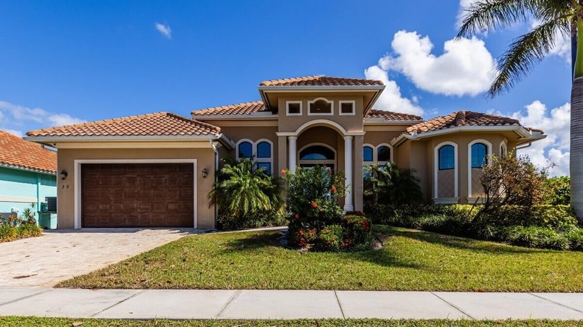 Embrace the beauty of stunning sunrises from this exceptional - Beach Home for sale in Marco Island, Florida on Beachhouse.com