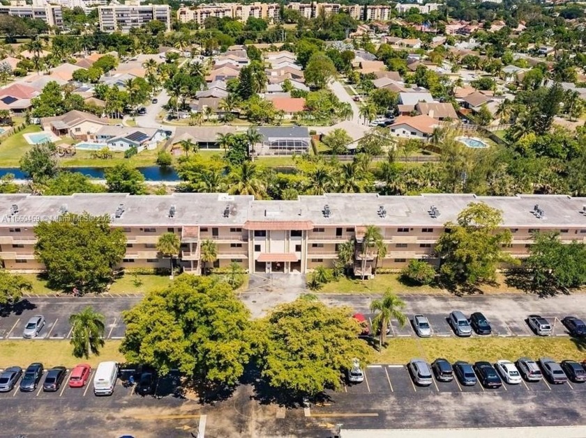 This charming 2-bedroom, 2-bath condo boasts a serene - Beach Condo for sale in Sunrise, Florida on Beachhouse.com