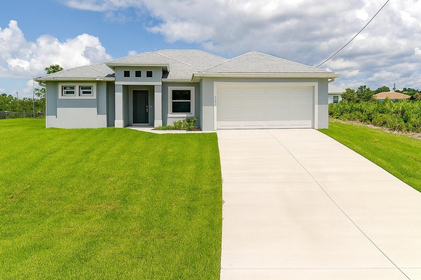 Beautiful 4bedroom, 3bath home featuring a bright open layout - Beach Home for sale in Lehigh Acres, Florida on Beachhouse.com