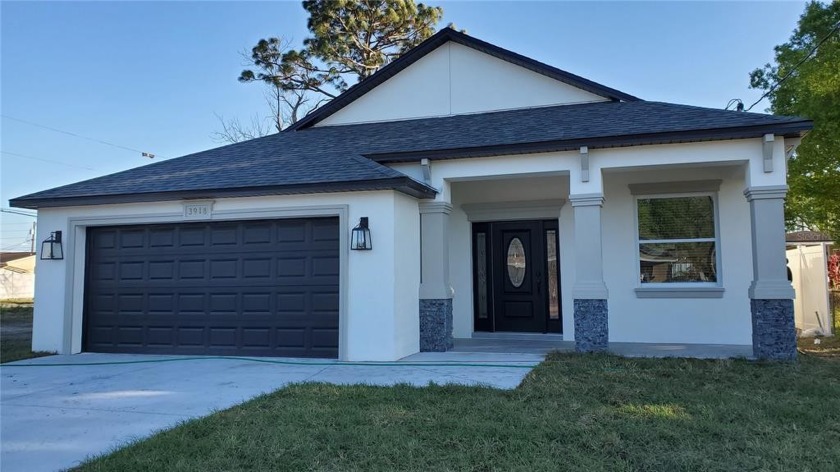 BRAND New 3 bedroom 2 bath Home! The moment you enter though the - Beach Home for sale in Tampa, Florida on Beachhouse.com