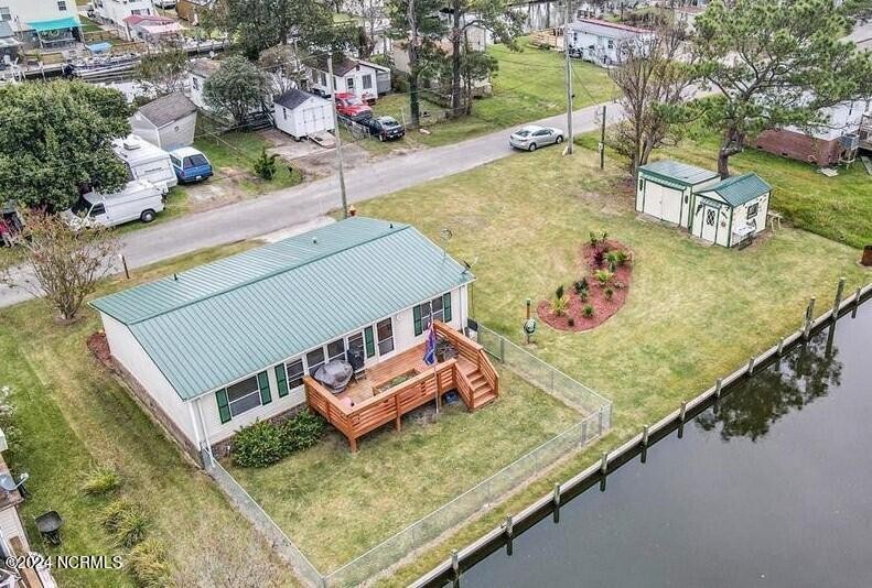 NICE Canal front home on .31 of an acre.  3 bedroom 2 bath home - Beach Home for sale in Grandy, North Carolina on Beachhouse.com