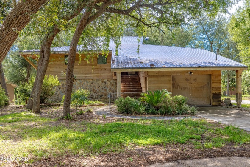 Waterfront Oasis with over 100' of shoreline with Gulf Access - Beach Home for sale in Panama City, Florida on Beachhouse.com