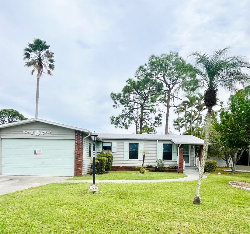 Charming 2-Bed, 2-Bath Home with Water View in Pine Lakes - Beach Home for sale in North Fort Myers, Florida on Beachhouse.com