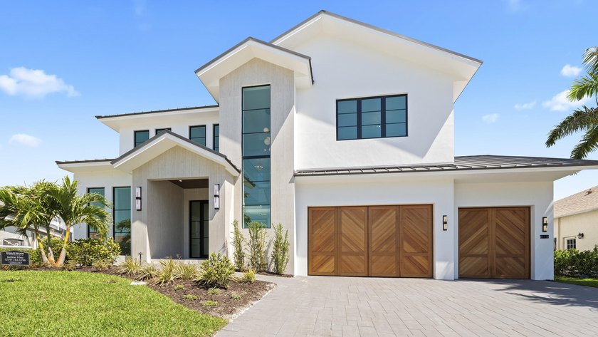 NEW CONSTRUCTION Indulge in the pinnacle of coastal luxury with - Beach Home for sale in Marco Island, Florida on Beachhouse.com