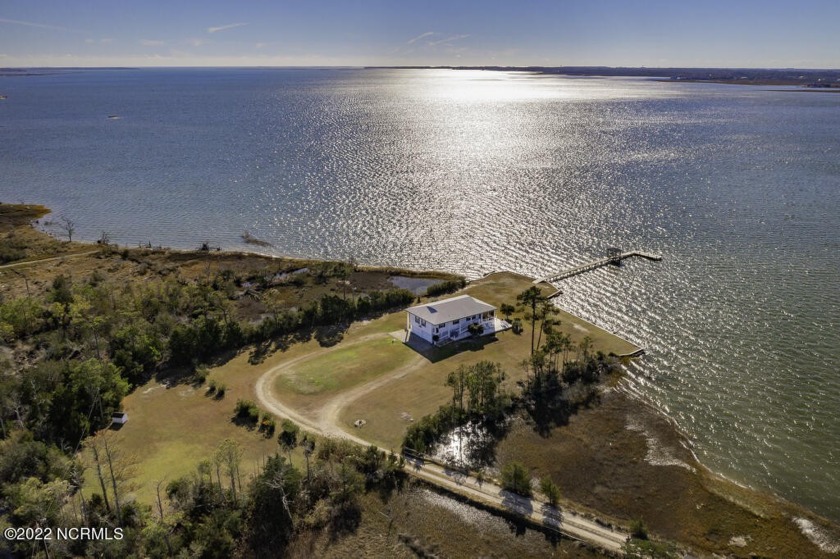 Welcome to this peaceful waterfront retreat! With a great rental - Beach Home for sale in Beaufort, North Carolina on Beachhouse.com