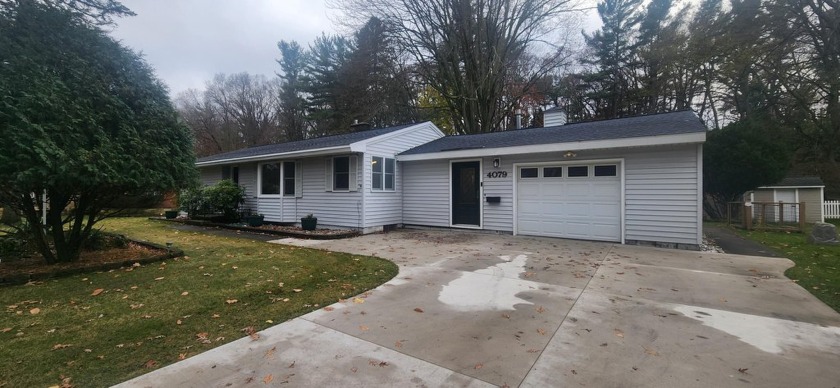 Discover this beautifully refreshed 3 bed home in the highly - Beach Home for sale in Norton Shores, Michigan on Beachhouse.com