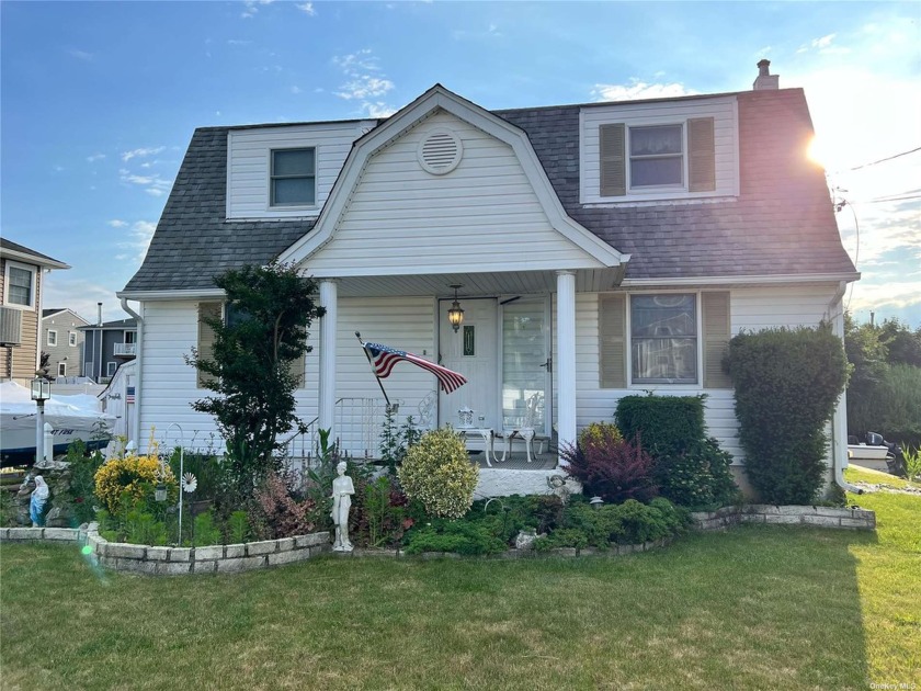 Discover waterfront tranquility in Seaford Harbor with this - Beach Home for sale in Seaford, New York on Beachhouse.com