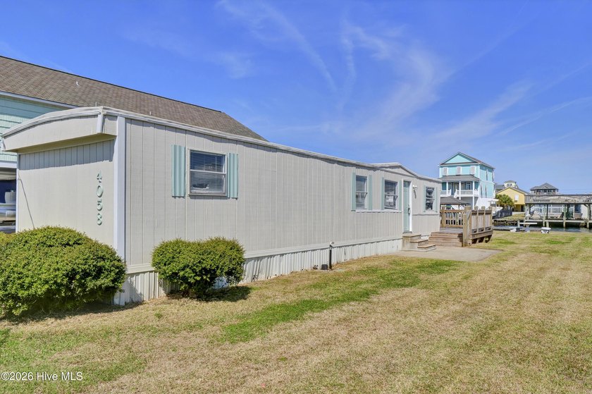 Rare opportunity to own a canal front property in the heart of - Beach Home for sale in Surf City, North Carolina on Beachhouse.com