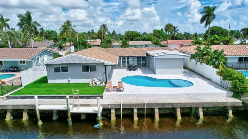 COMPLETELY RENOVATED CORAL RIDGE ISLE WATERFRONT POOL HOME WITH - Beach Home for sale in Fort Lauderdale, Florida on Beachhouse.com