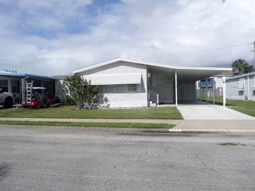 Park under the carport to stay out of the rain. You will notice - Beach Home for sale in Melbourne, Florida on Beachhouse.com