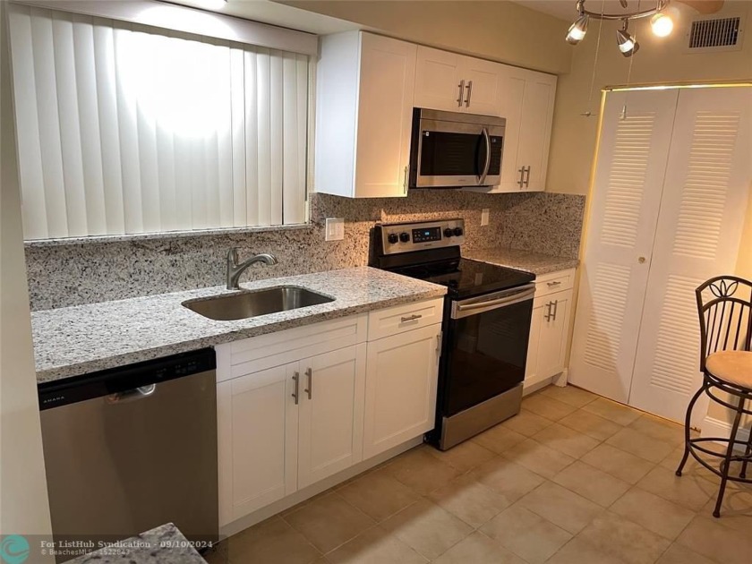 Remodeled and ready for new occupant! New Kitchen, wood cabinets - Beach Condo for sale in Delray Beach, Florida on Beachhouse.com